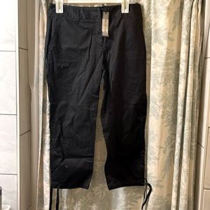 Talbots petite size 8P in black. Fit slightly below the waist with ties @ bottom